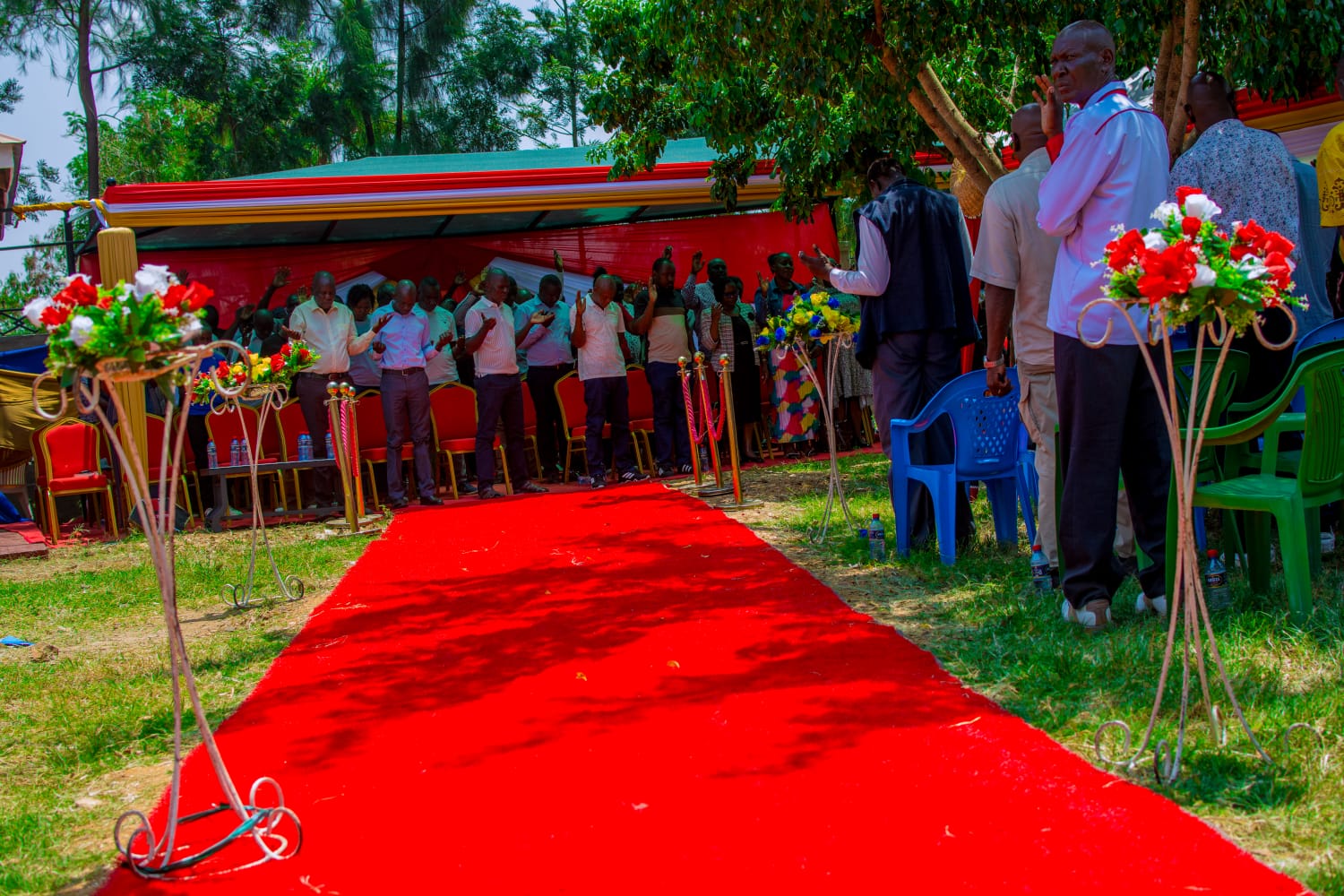Guests standing along the red carpet at the ceremony