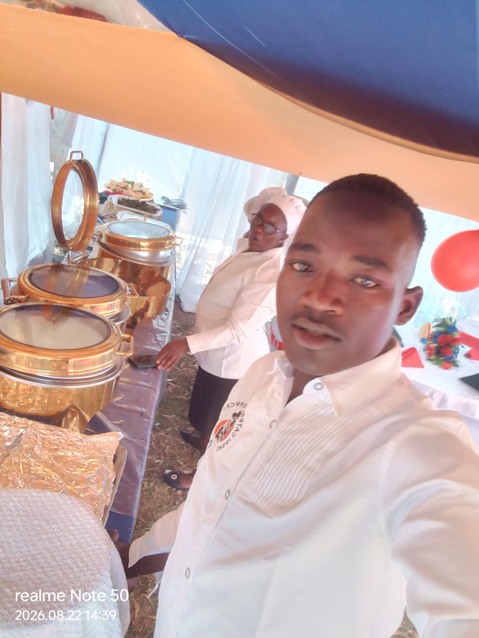 Gold chafing dishes set up along the service line