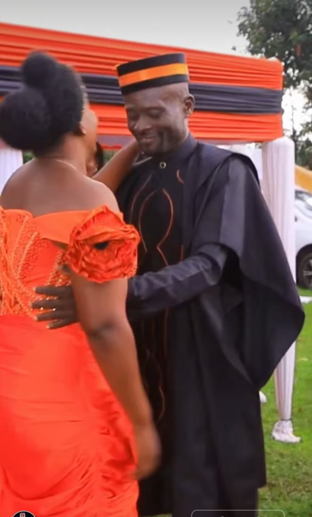 Couple in traditional ceremony attire