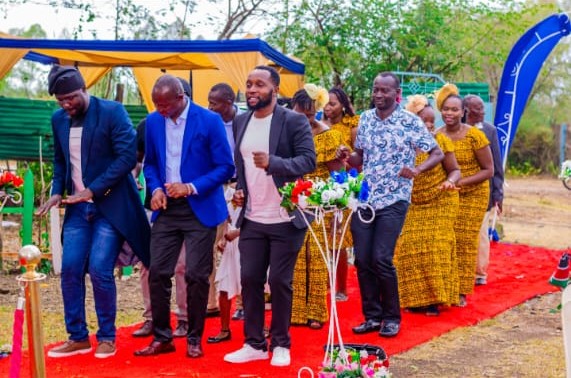 Guests dancing on the red carpet at the ceremony