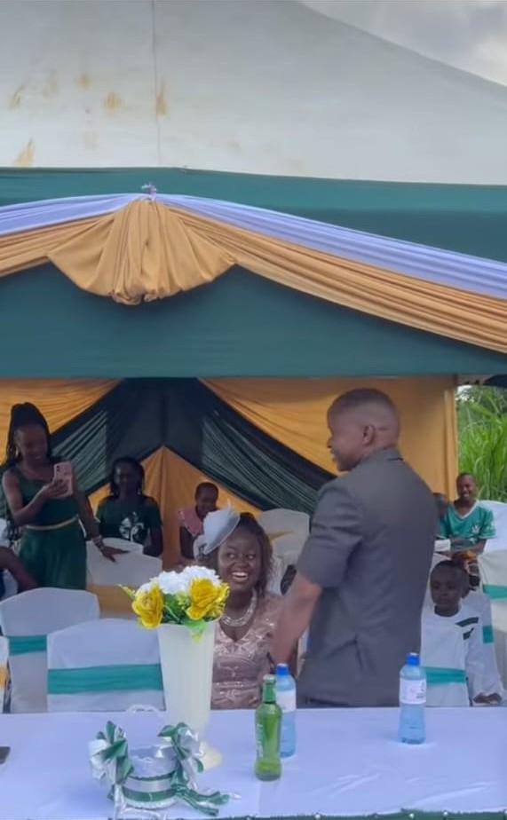 Green and gold tent with high table setup
