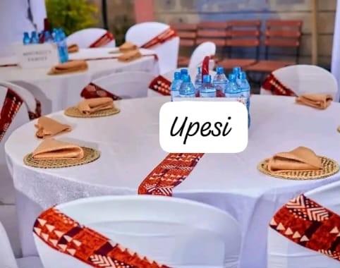 White reception table with red accents